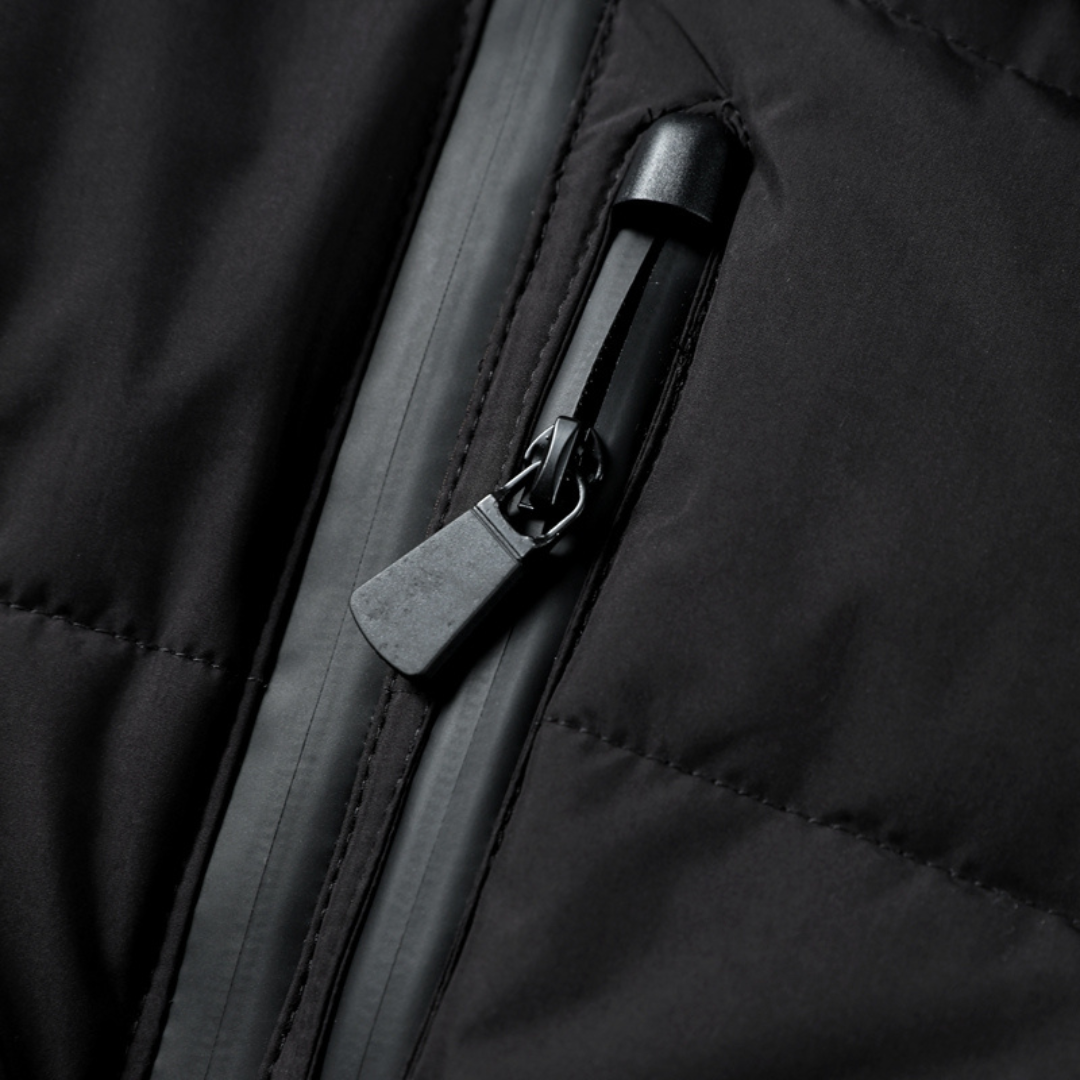 Stylish women's black belted puffer jacket. Warm winter coat with hood, perfect quilted outerwear for cold weather.