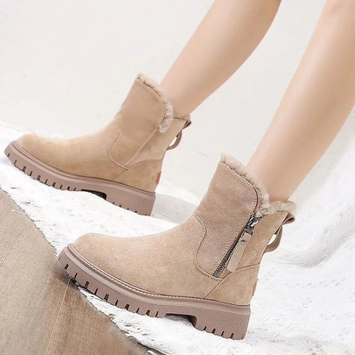 Comfortable women's slip-on ankle boots with a warm fleece lining and sturdy chunky sole for winter.