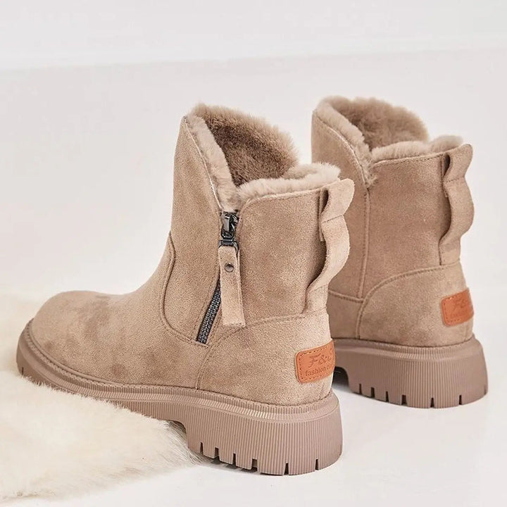 Women's warm slip-on ankle boots, fleece-lined for ultimate comfort, with a fashionable chunky sole for winter.