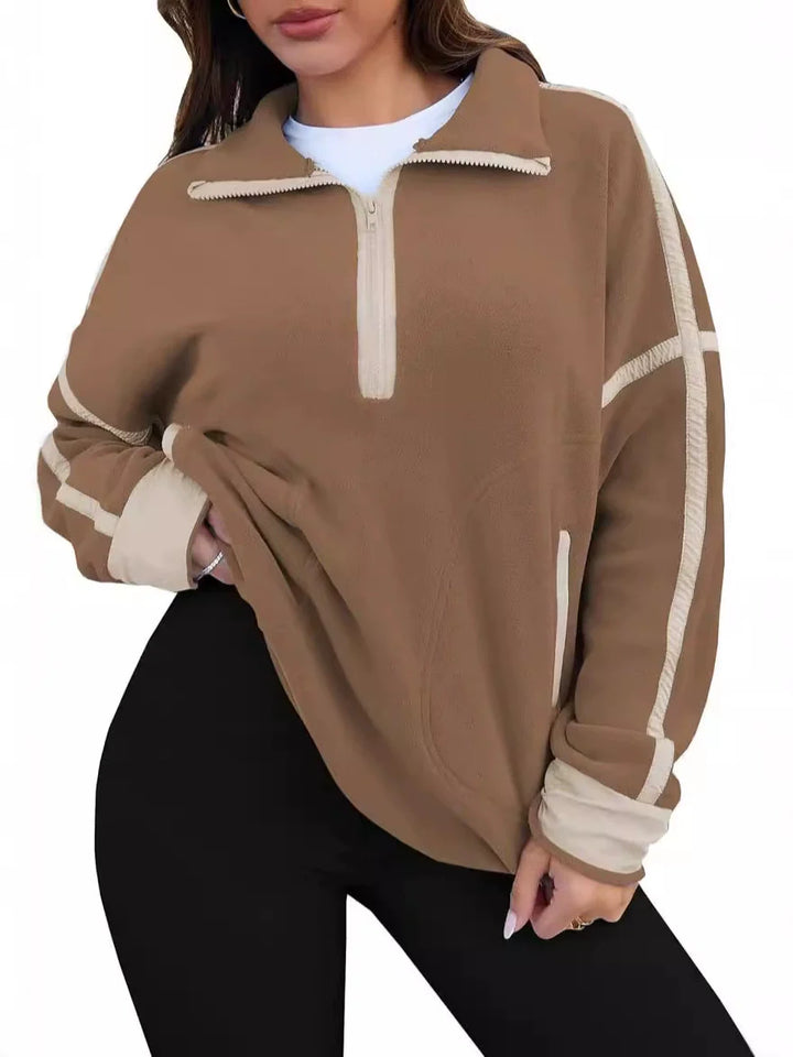 Cozy women's quarter-zip top, comfortable and warm long sleeve pullover for casual fashion.