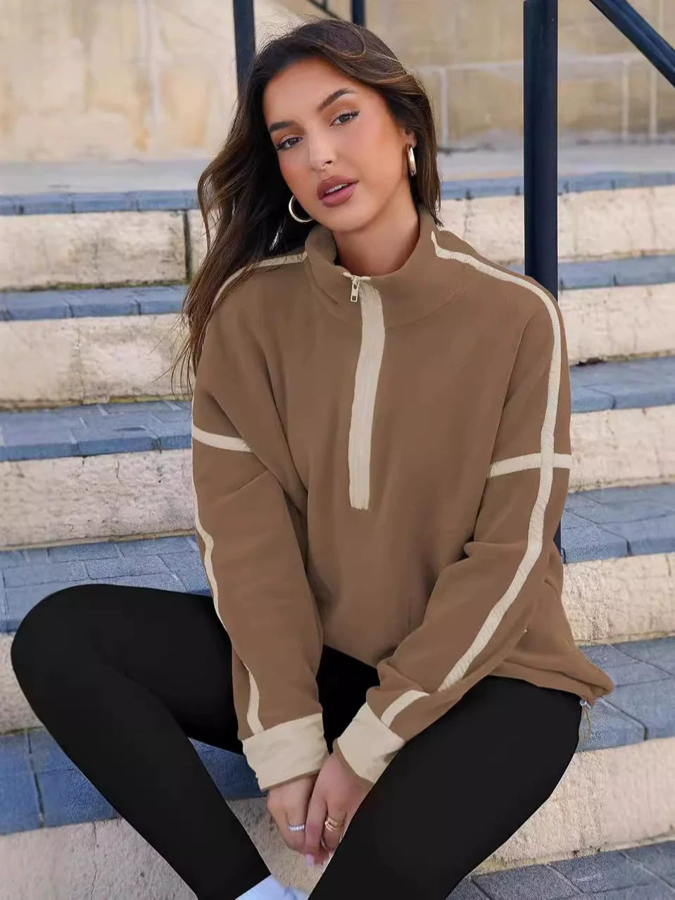 Women's stylish quarter-zip pullover, a comfortable zip-up long sleeve top for everyday wear.