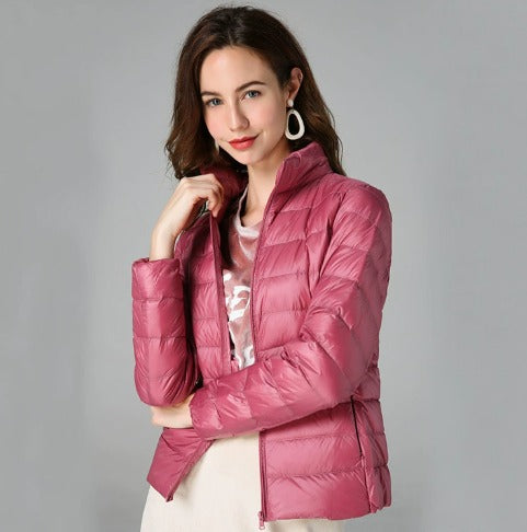 Versatile women's warm quilted puffer jacket, long sleeve outerwear for stylish fall and winter fashion.