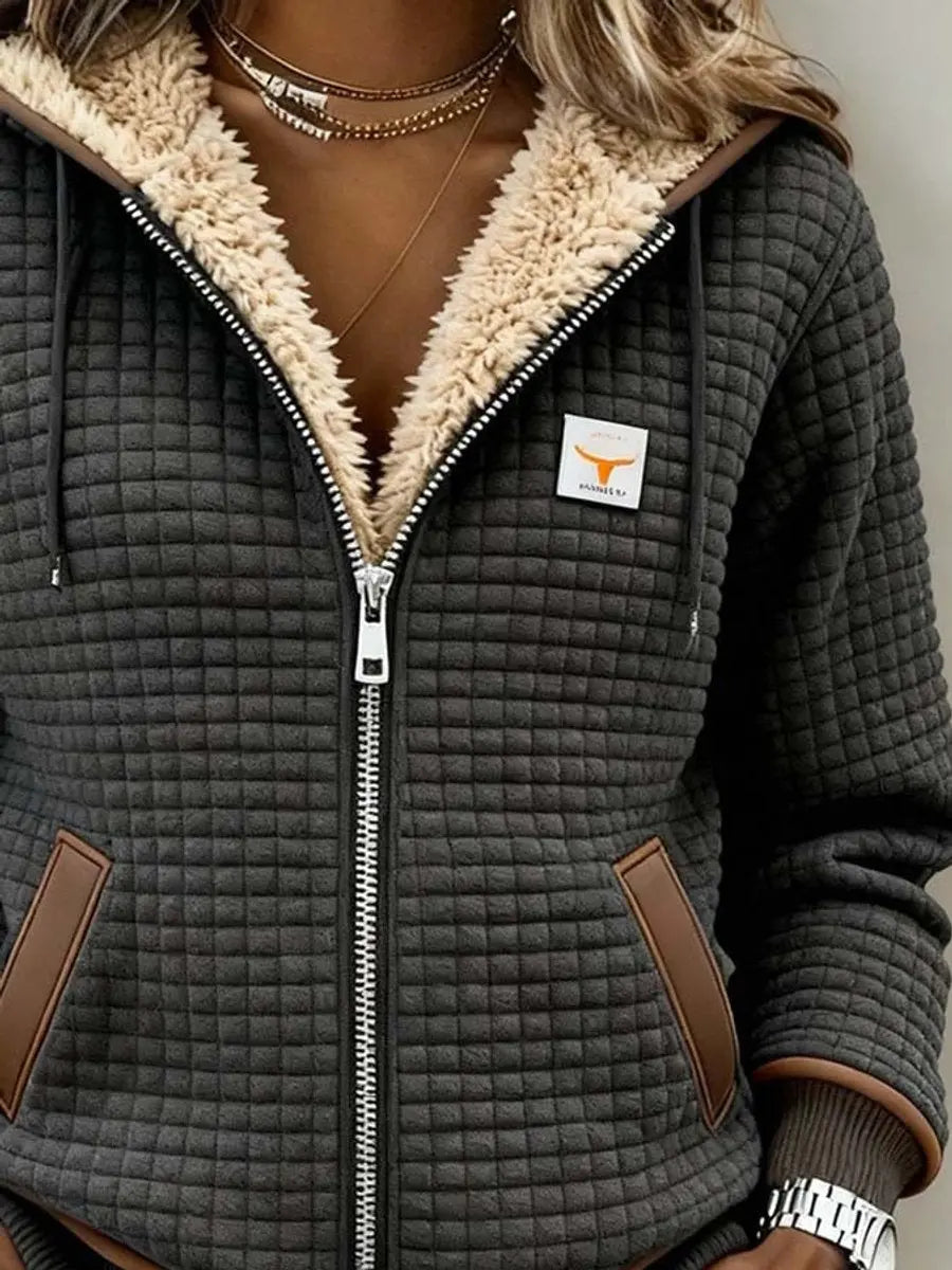 Stylish women's hooded quilted winter jacket with plush lining & zip-up front, ideal for casual autumn & winter wear.