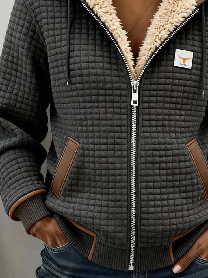 Cozy women's quilted winter coat, Sherpa fleece lined for ultimate warmth. A stylish & practical everyday jacket.