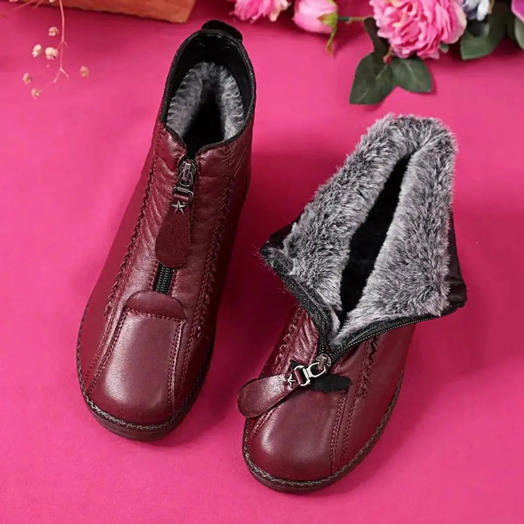Women's warm zip-up ankle boots with non-slip grip, perfect for winter comfort & everyday wear.