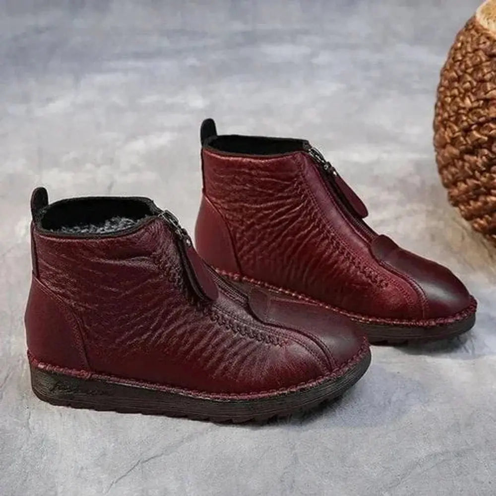 Stylish women's zip-up ankle boots, designed for warmth and comfort with a non-slip sole for winter.