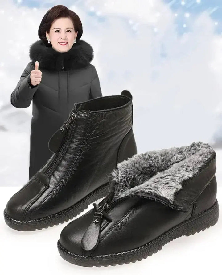 Soft, warm women's ankle boots with a practical zip-up closure and non-slip grip for winter footwear.