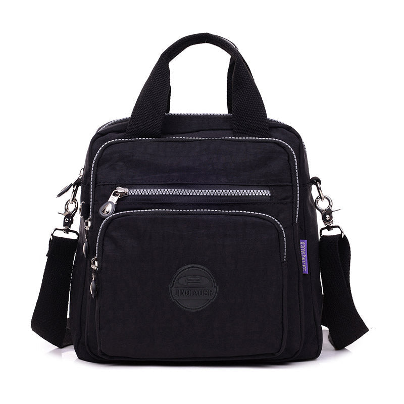 Interior view of multifunctional women's crossbody bag, revealing organized compartments.