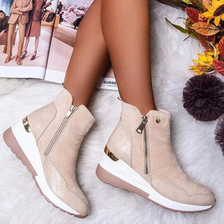 Stylish women's waterproof ankle boots. Durable for winter, rain, and casual wear. Designed for all-day comfort.