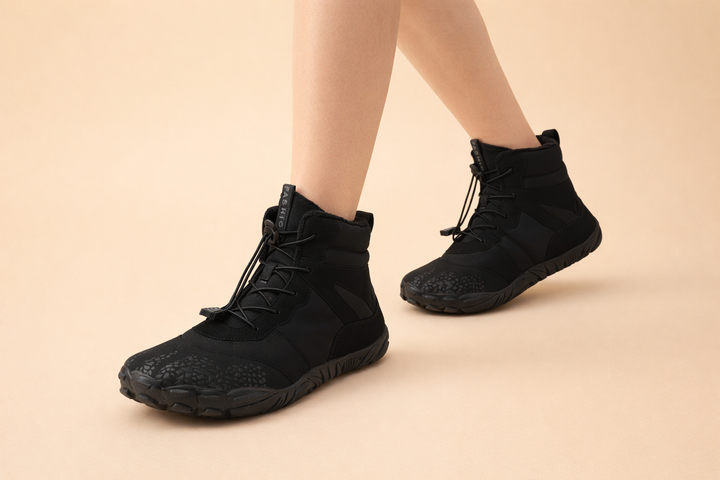 Navy waterproof women's winter boots, barefoot design, perfect for cold weather and comfort.