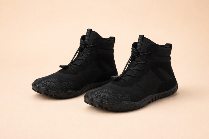 Pink women's waterproof barefoot winter boots, stylish minimalist design, warm & comfy.