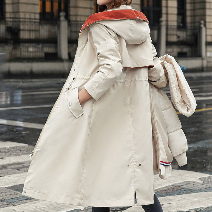 Stylish women's windbreaker jacket with waterproof hood for active lifestyles.
