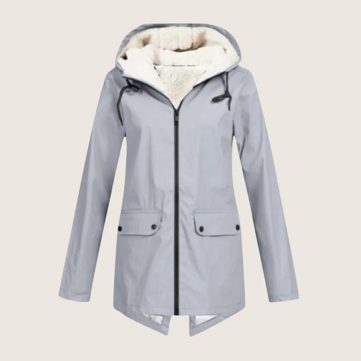 Outdoor women's hooded waterproof jacket, windproof, perfect for hiking and casual weather protection.
