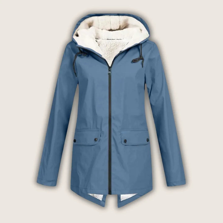 Comfortable women's hooded waterproof jacket, offering weather protection with practical front pockets.