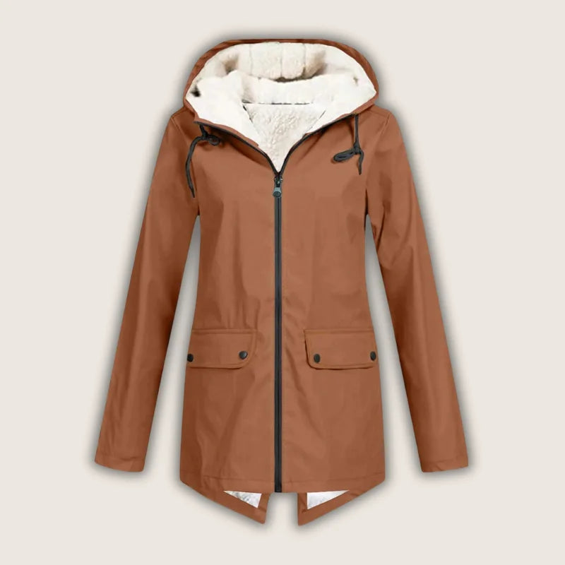 Versatile women's waterproof hooded jacket, great for casual wear, wind protection, and outdoor activities.