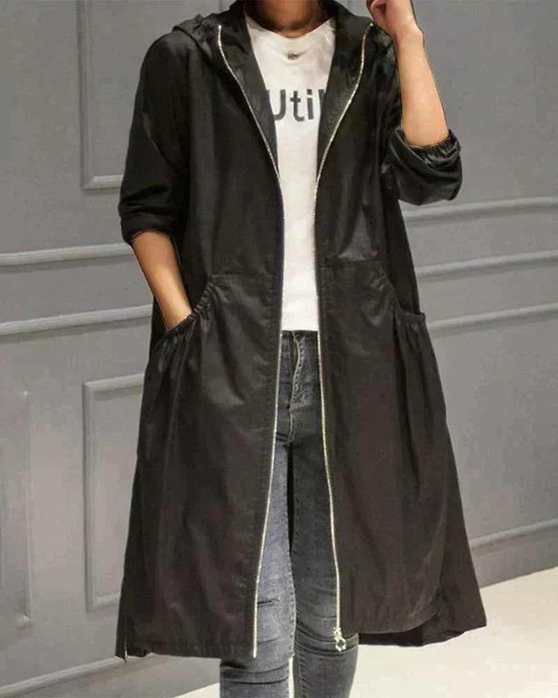 Comfortable relaxed fit women's hooded jacket, knee-length & waterproof, ideal for daily all-weather protection.