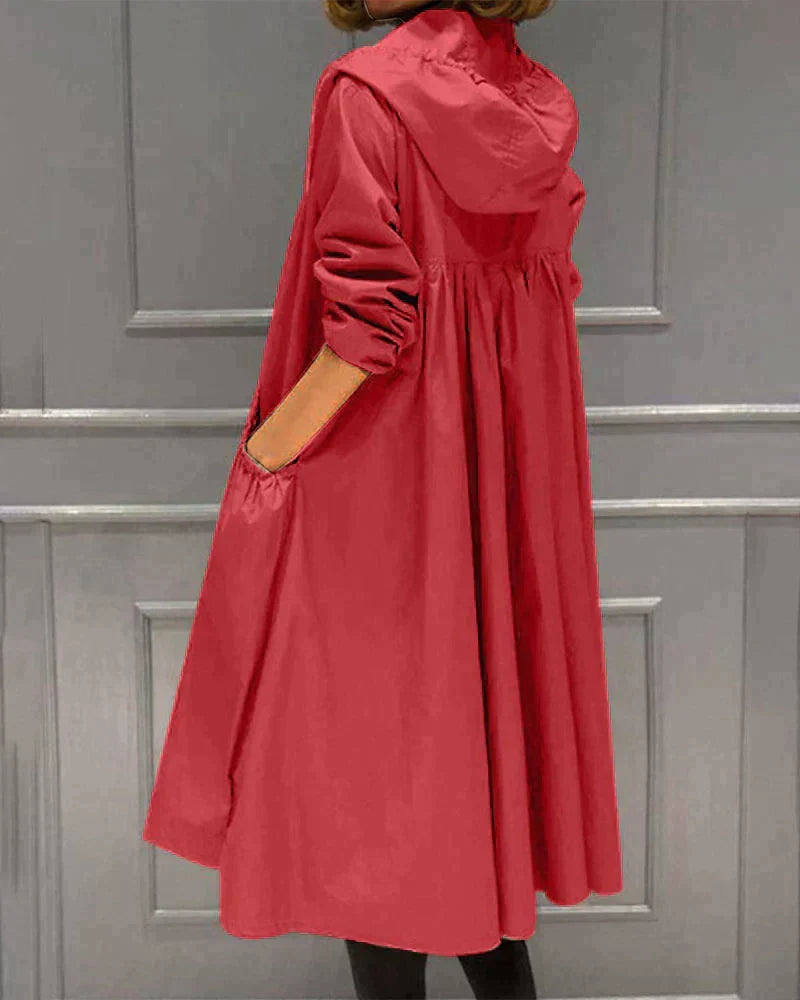 Lightweight women's waterproof hooded jacket, knee-length, relaxed fit, stylish for spring & fall outerwear.