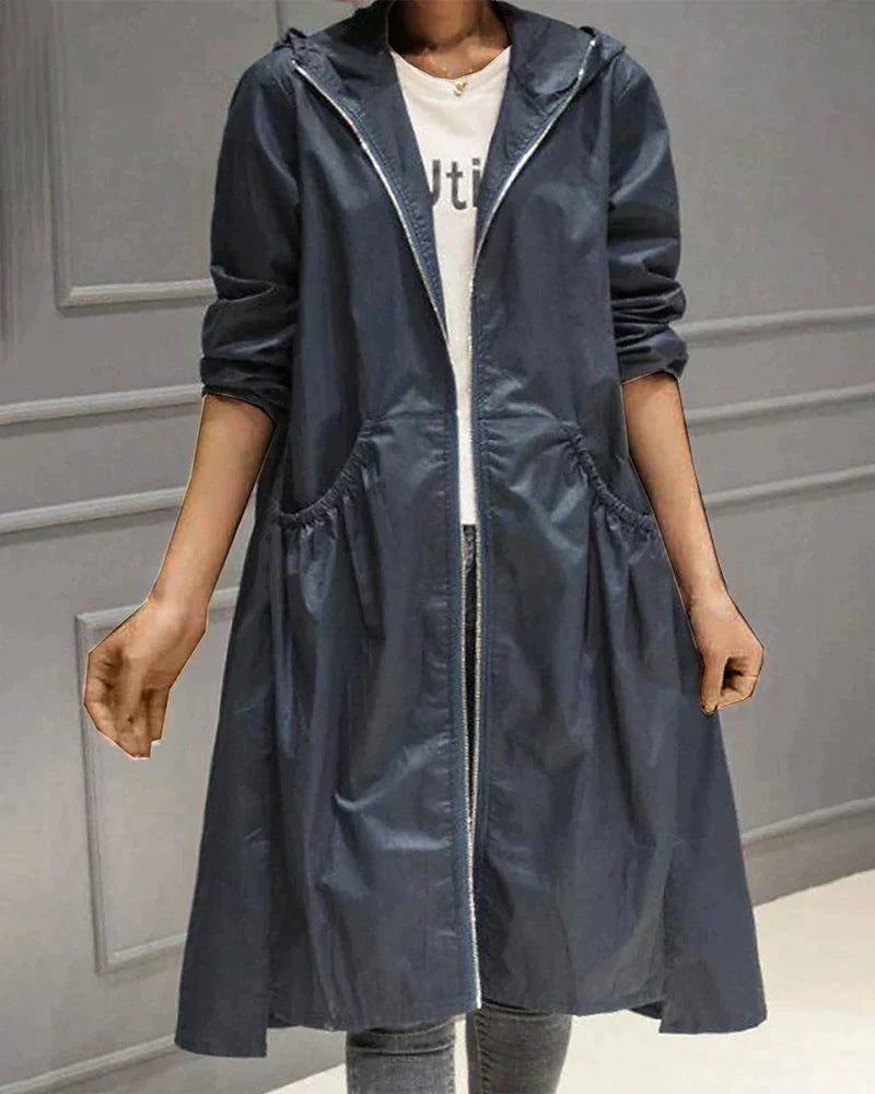 Women's all-weather waterproof jacket, hooded, knee-length, relaxed fit, a stylish & practical rain outerwear.