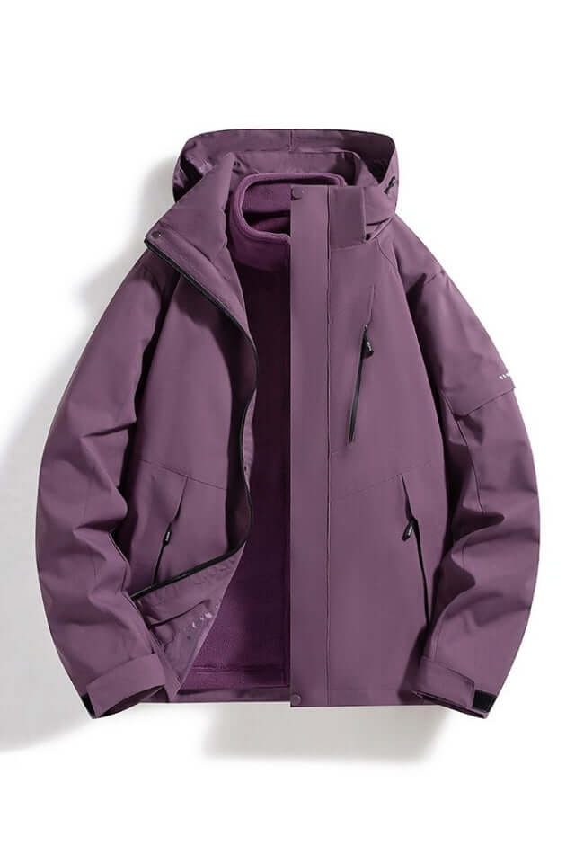 Stylish women's hooded waterproof windbreaker, ideal outerwear for all-weather outdoor sports & travel.