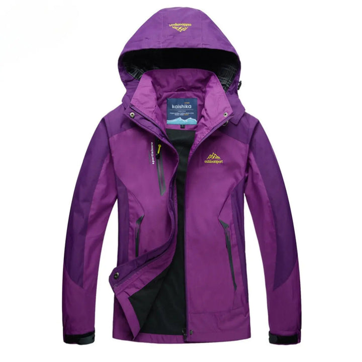 Versatile women's waterproof quilted jacket with hood. Perfect lightweight apparel for hiking & casual use.