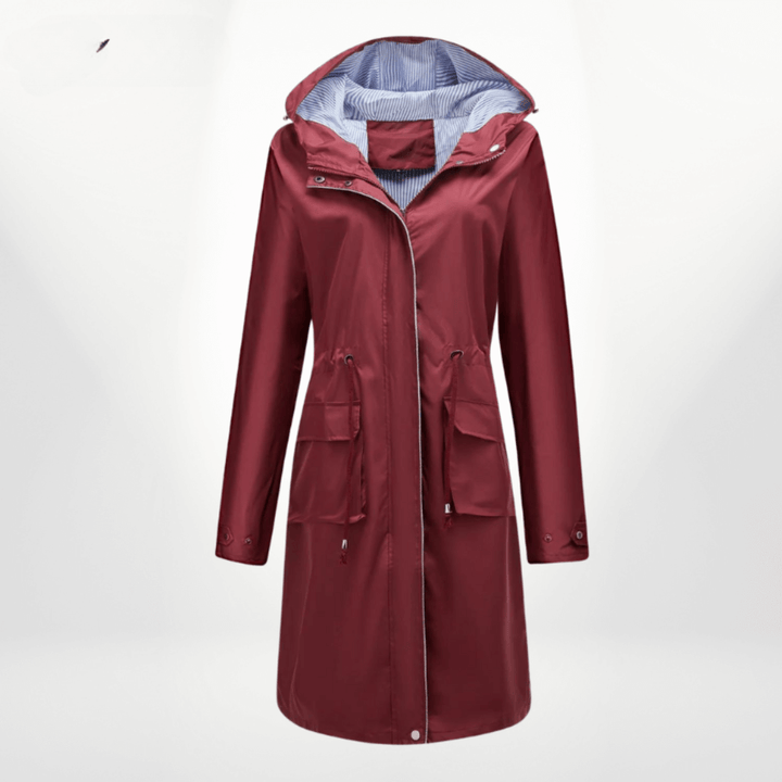 Women's stylish waterproof over-knee trench coat, durable all-weather outerwear for spring/fall.