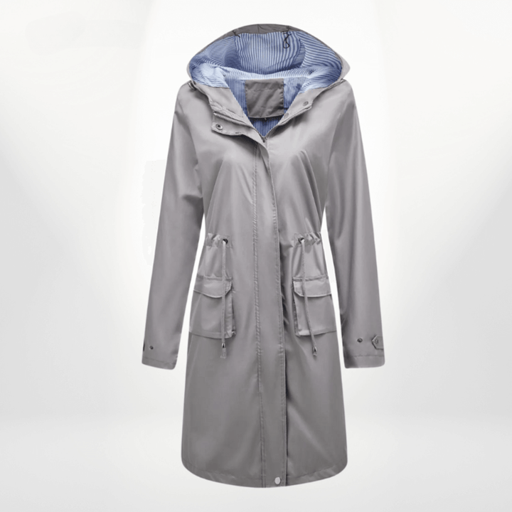 Fashionable women's waterproof raincoat, over-knee trench style for practical outdoor wear.