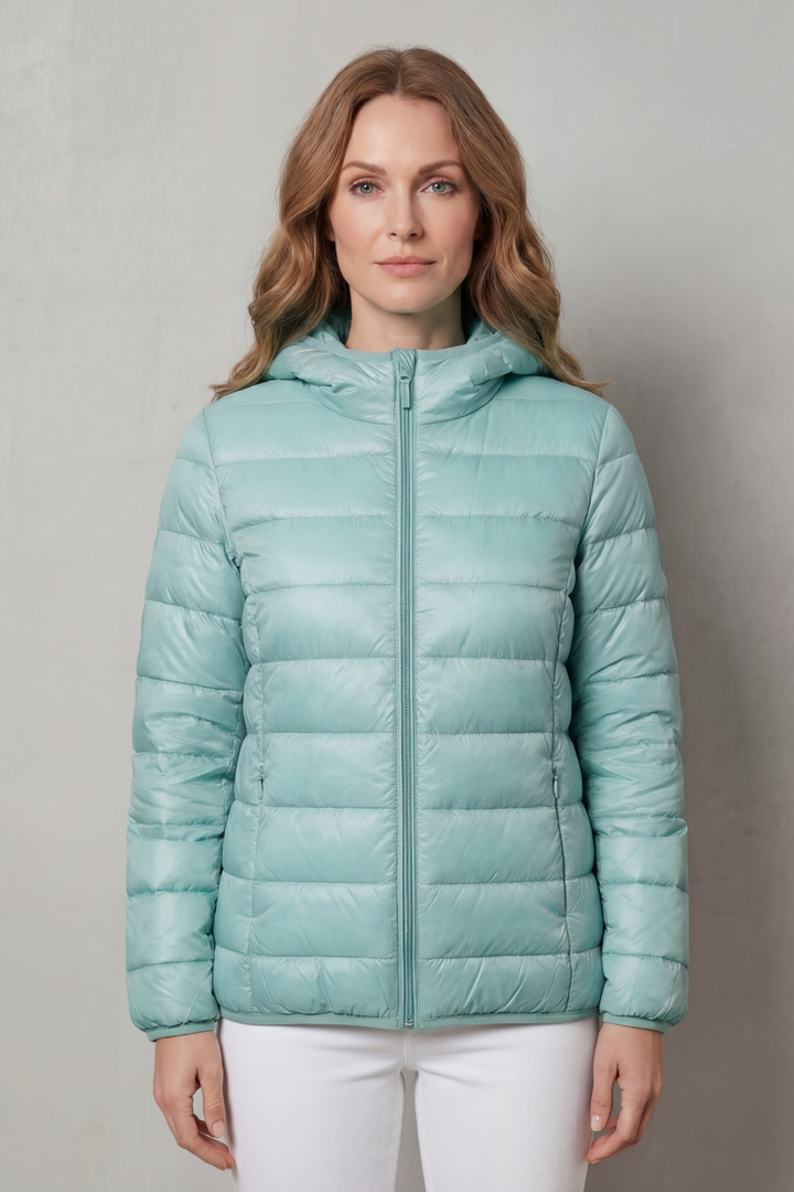 Chic women's waterproof rain coat. Stylish layering outerwear for urban explorers and all-season weather.