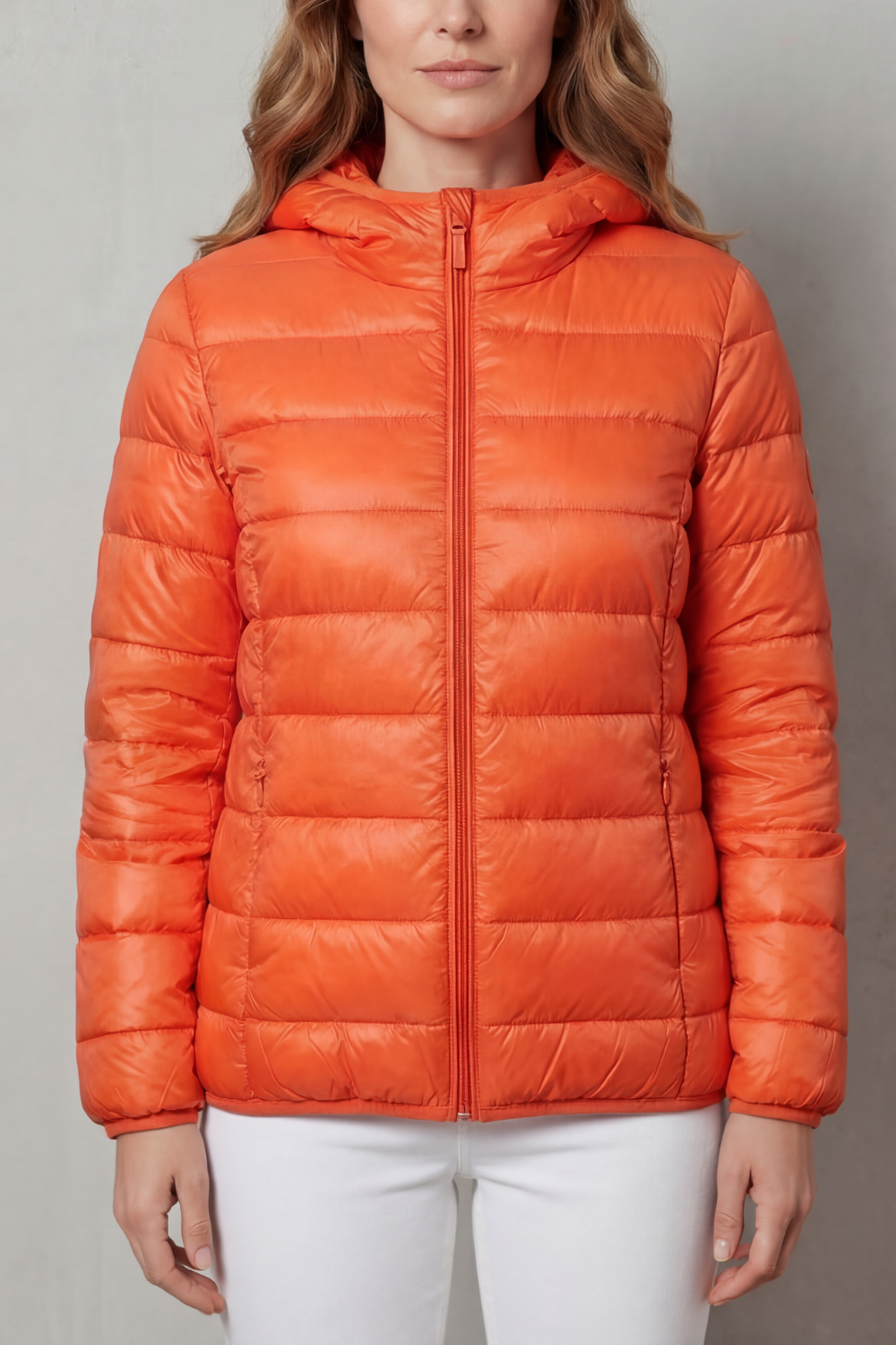 Durable women's waterproof rain jacket. Long-lasting layering outerwear for all-season protection and travel.
