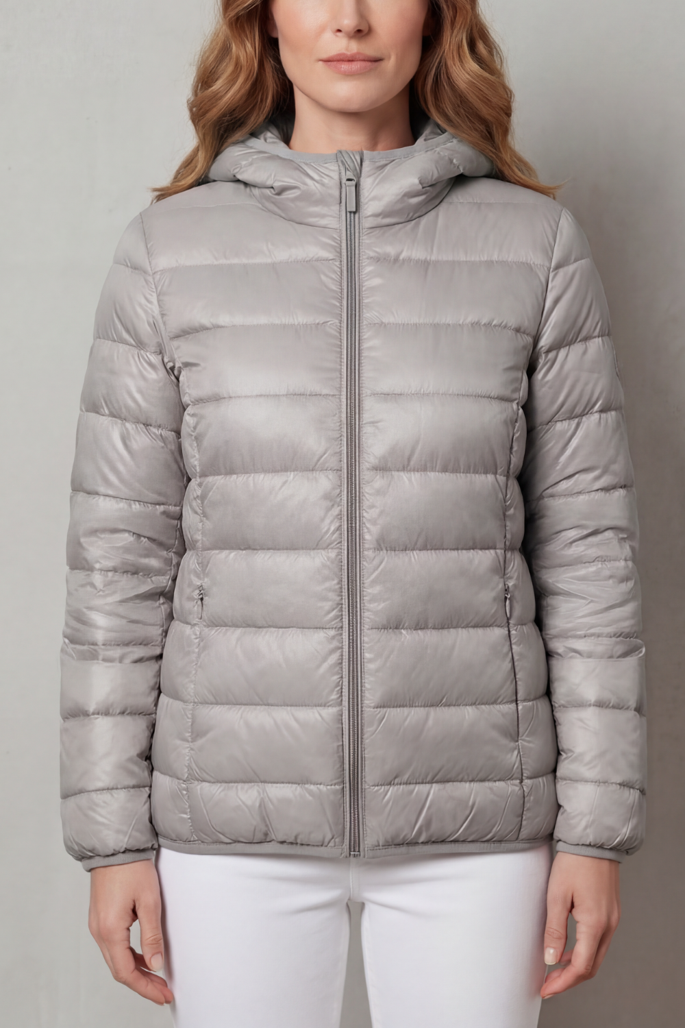 Side view of versatile women's waterproof rain jacket. All-weather layering outerwear, great for any season.