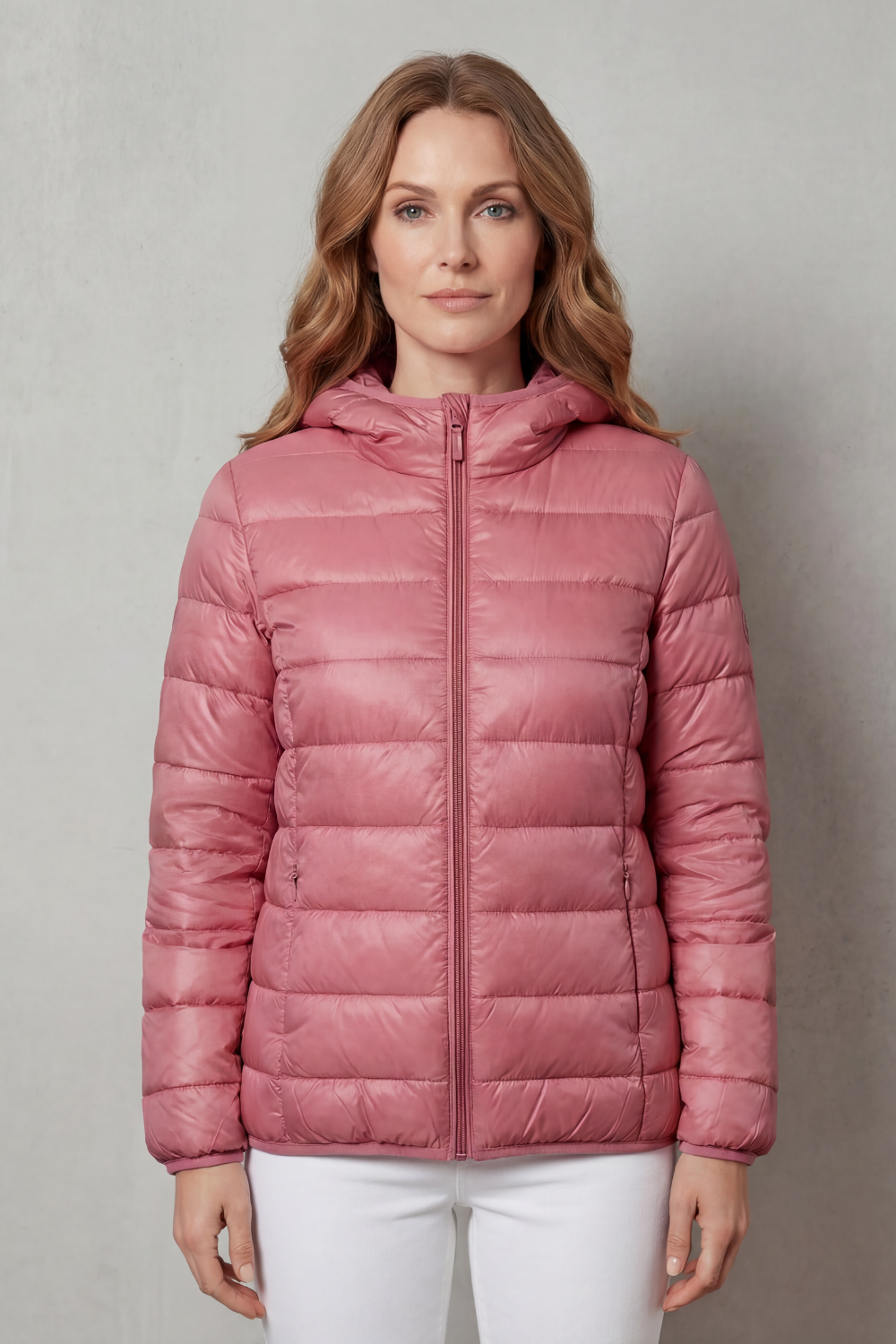 Woman in stylish waterproof rain jacket. Perfect layering outerwear for casual wear and all-weather protection.