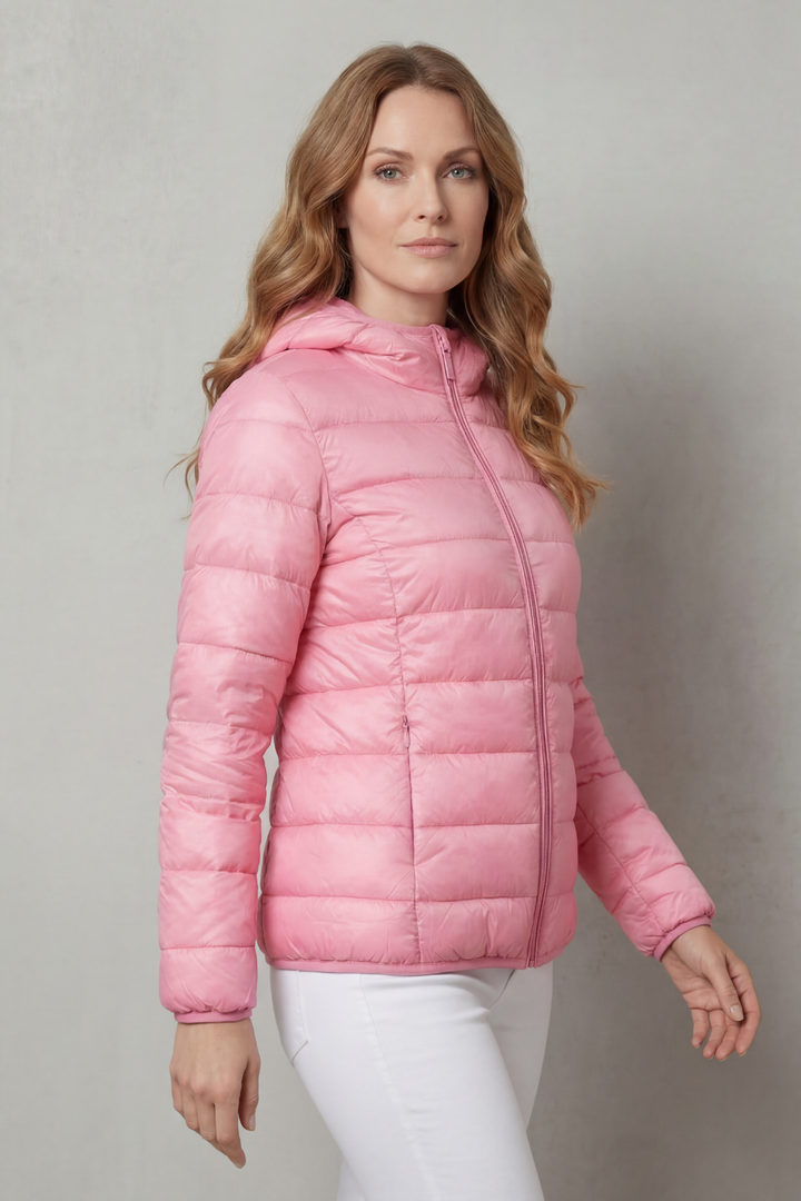 Versatile women's layering rain coat. Waterproof and lightweight, suitable for all seasons and outdoor adventures.