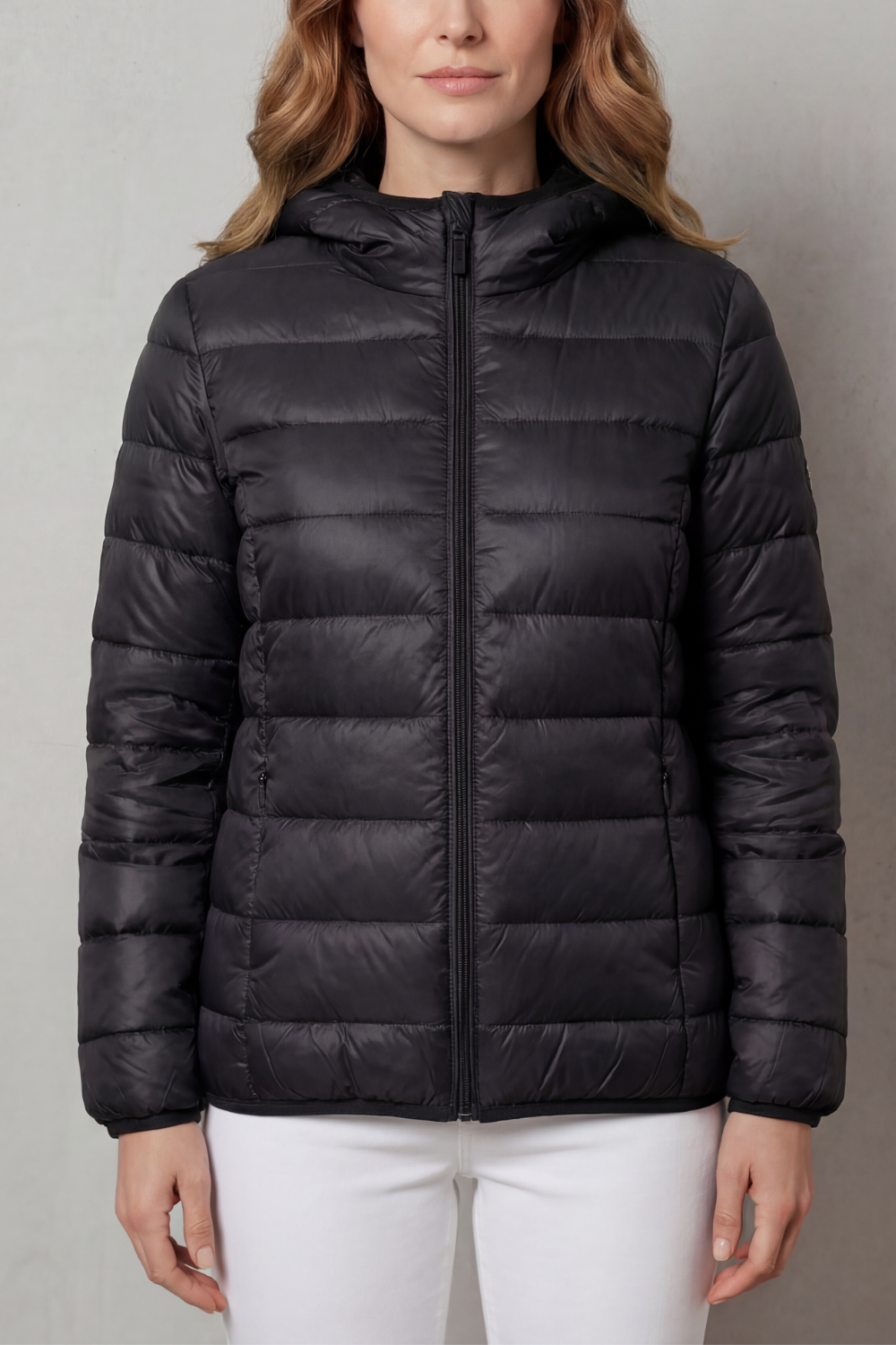 Breathable women's waterproof rain coat. Lightweight layering outerwear for active all-weather outdoor activities.