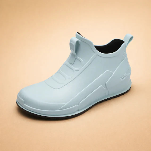 Versatile women's waterproof fashion ankle boots, slip-on for quick wear, suitable for casual & chic outfits.