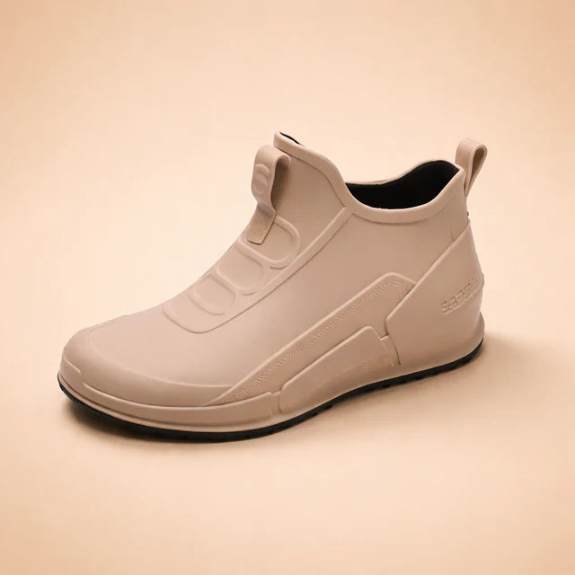 Practical women's waterproof slip-on ankle boots, comfortable for all-day wear, perfect for rainy weather.