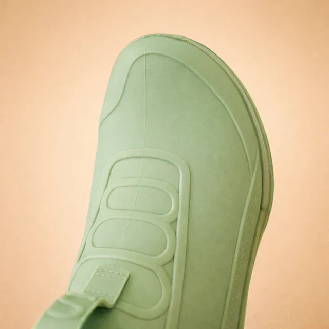 Fashionable women's waterproof slip-on ankle boots, providing all-day comfort & chic everyday style.