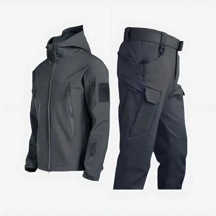 Complete women's outdoor tactical set: waterproof hooded jacket and functional cargo pants.