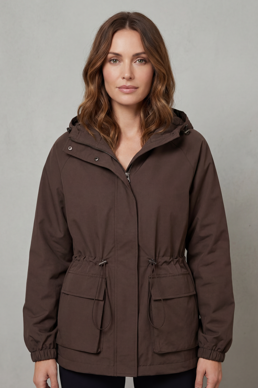 Versatile women's waterproof utility jacket, ideal for spring & autumn rain.
