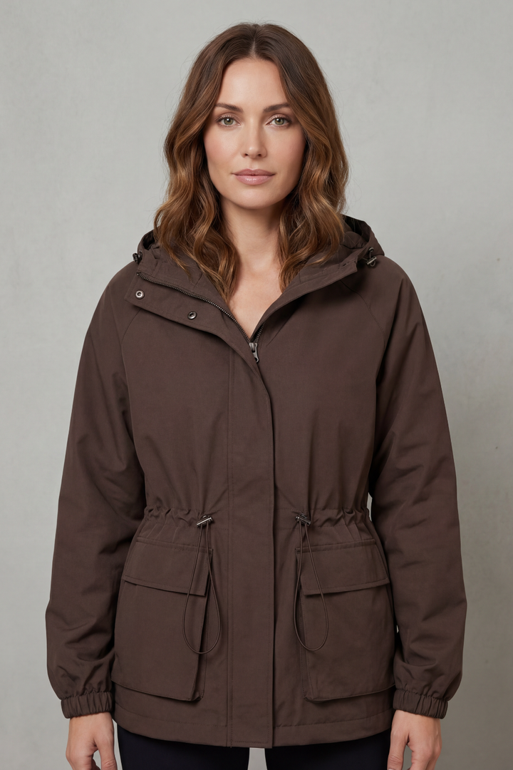 Versatile women's waterproof utility jacket, ideal for spring & autumn rain.