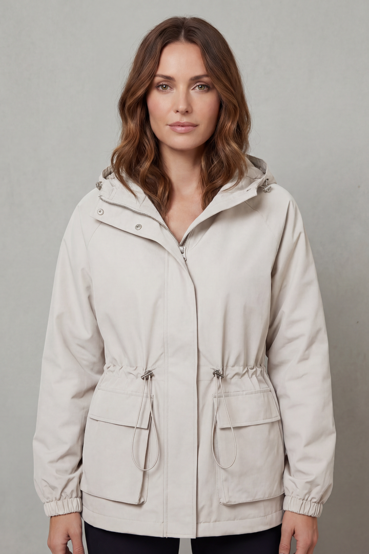 Casual women's waterproof utility jacket with adjustable drawstring, perfect for daily wear.