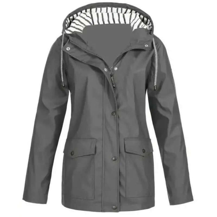 All-weather women's rain jacket, waterproof & windproof for ultimate outdoor protection. Stylish activewear.