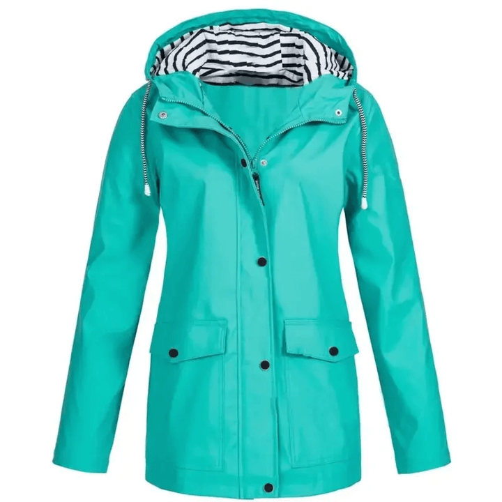 Versatile women's waterproof rain jacket. Windproof outerwear for hiking, travel, and daily use.