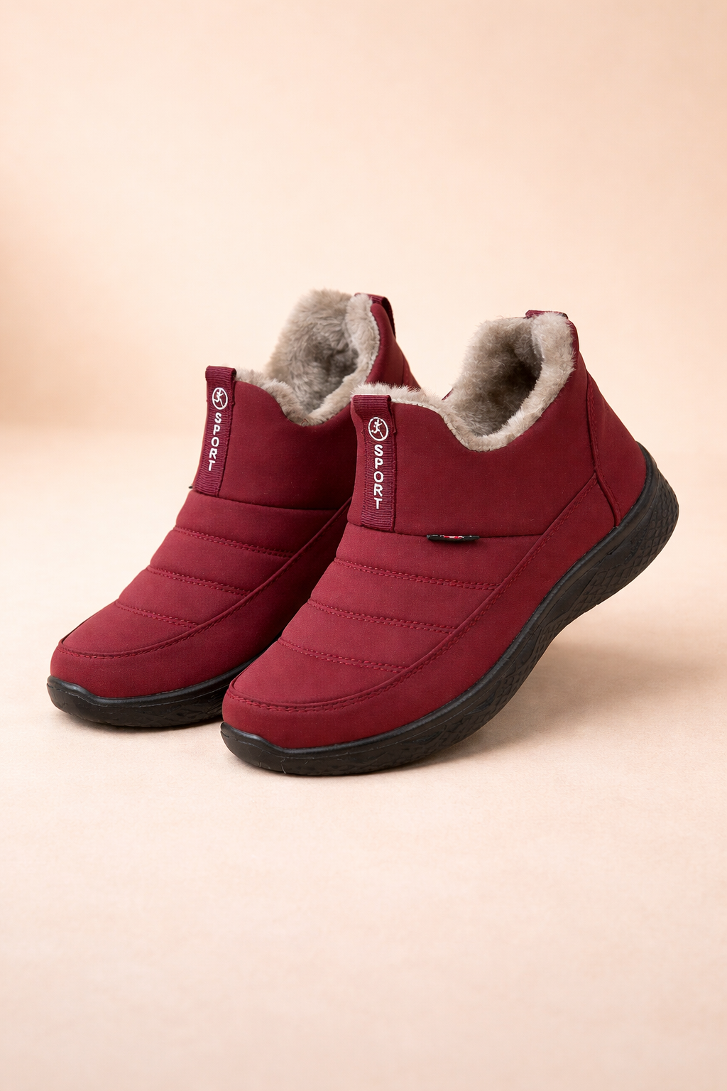 Women's waterproof winter ankle boots, ideal for cold weather. Cozy & stylish with a convenient zipper closure.