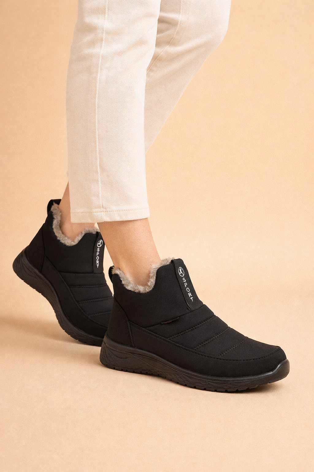 Durable women's waterproof winter ankle boots. Stay cozy & stylish in cold weather with these zipper boots.