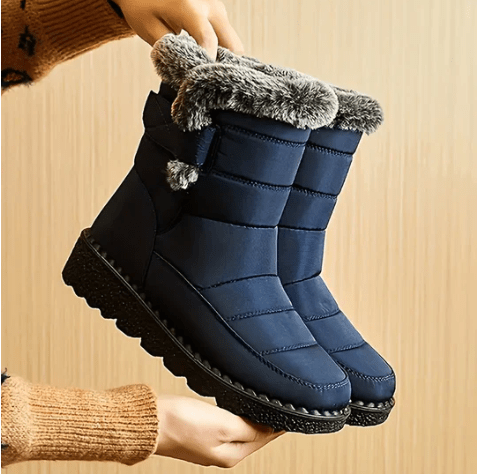 Women's waterproof winter ankle boots with a warm lining & comfortable platform sole for cold weather everyday wear.