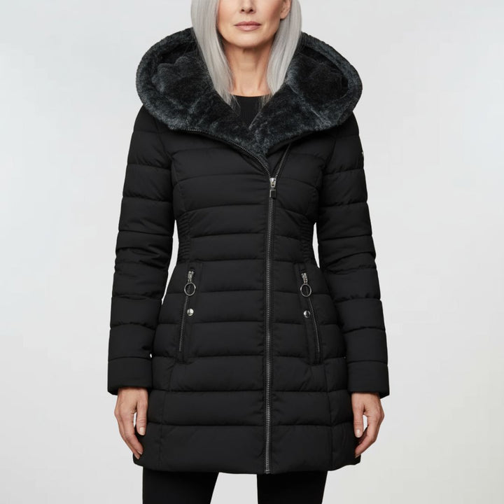 Warm women's waterproof winter jacket, perfect for cold and wet conditions. Durable rain jacket with hood.
