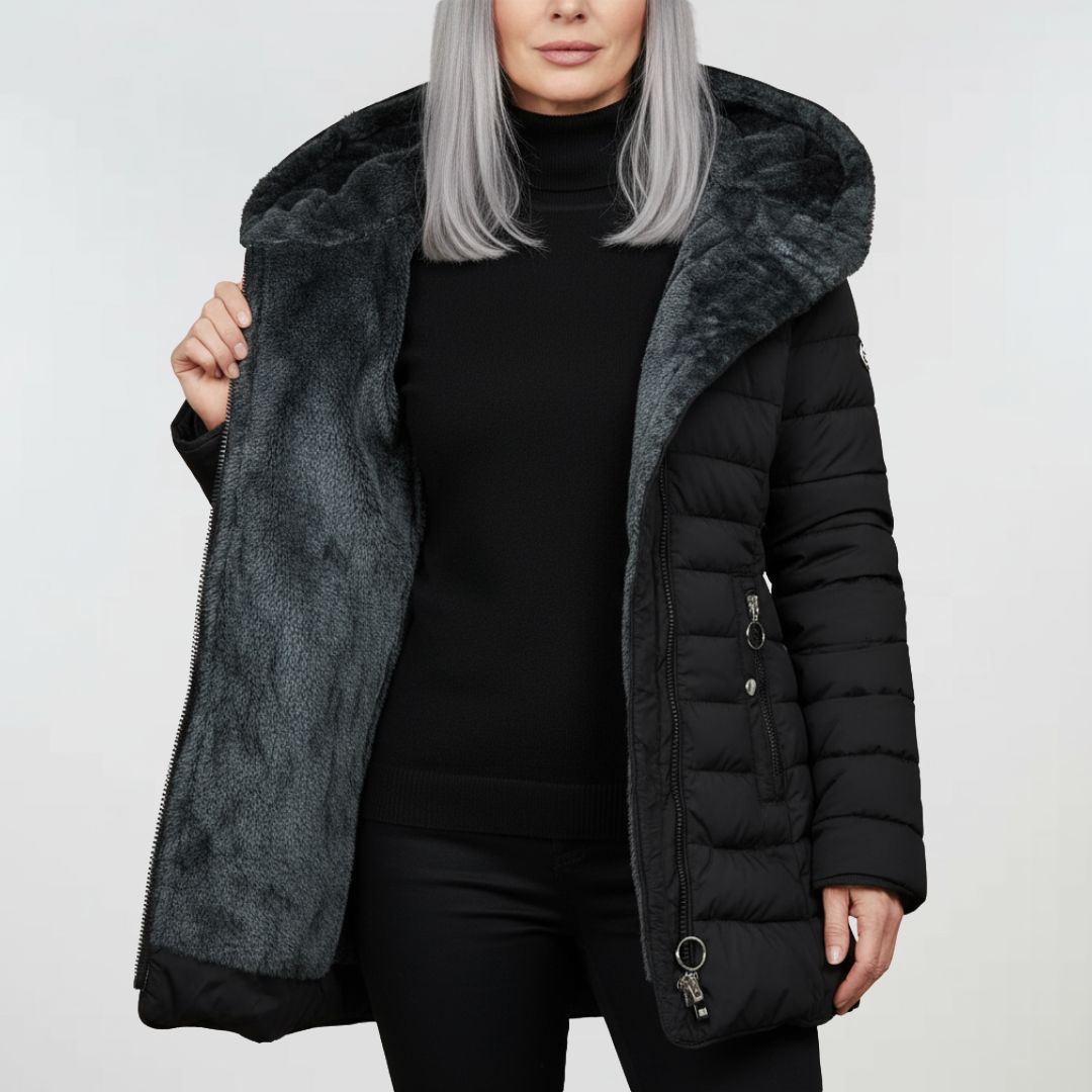 Stylish women's long winter coat, waterproof and warm. Ideal everyday outerwear for cold, rainy weather.