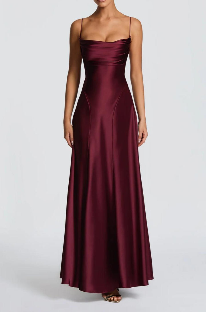 Strapless women's wedding guest maxi dress. Elegant formal gown with sweetheart neckline, ideal for special occasion parties.