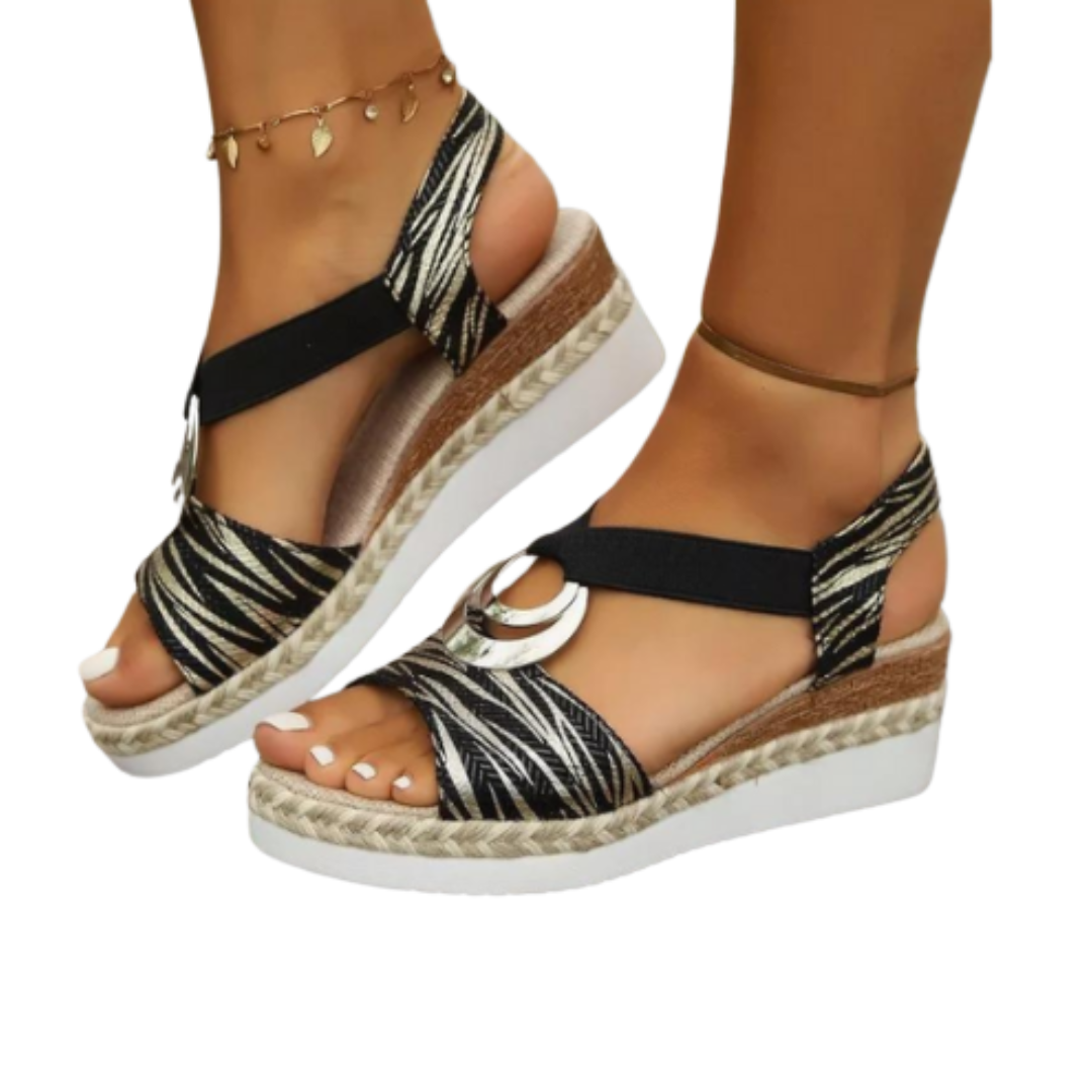 Women's wedge sandals with cushioned sole, providing supportive summer comfort. Perfect for walking & everyday wear.