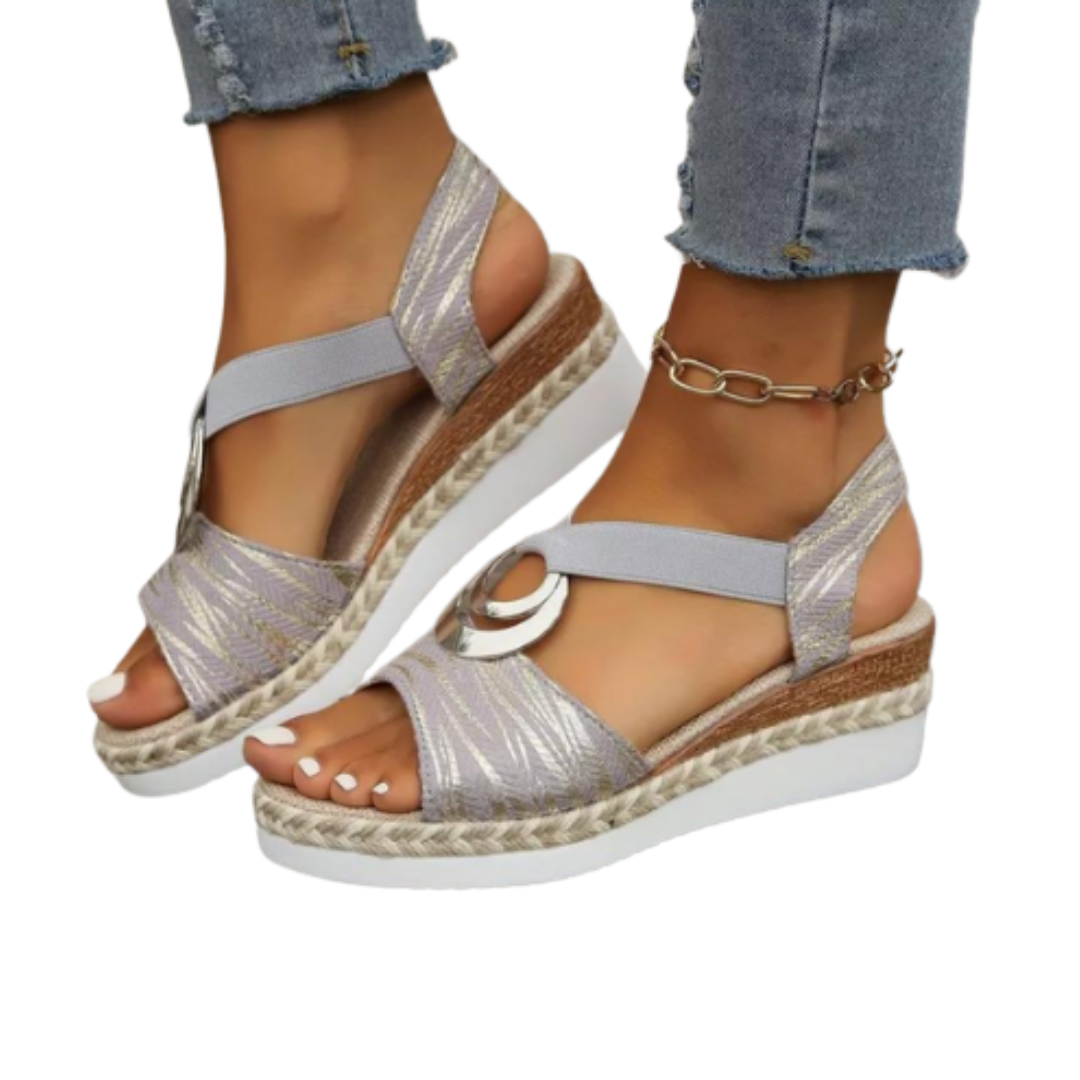 Comfortable women's wedge sandals with contoured cushioned sole, designed for all-day supportive summer walking.