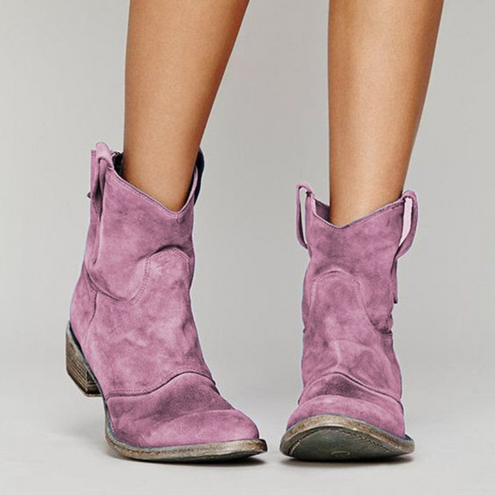 Women's fashion Western ankle boots with a comfortable block heel, easy pull-on tabs, and durable design.
